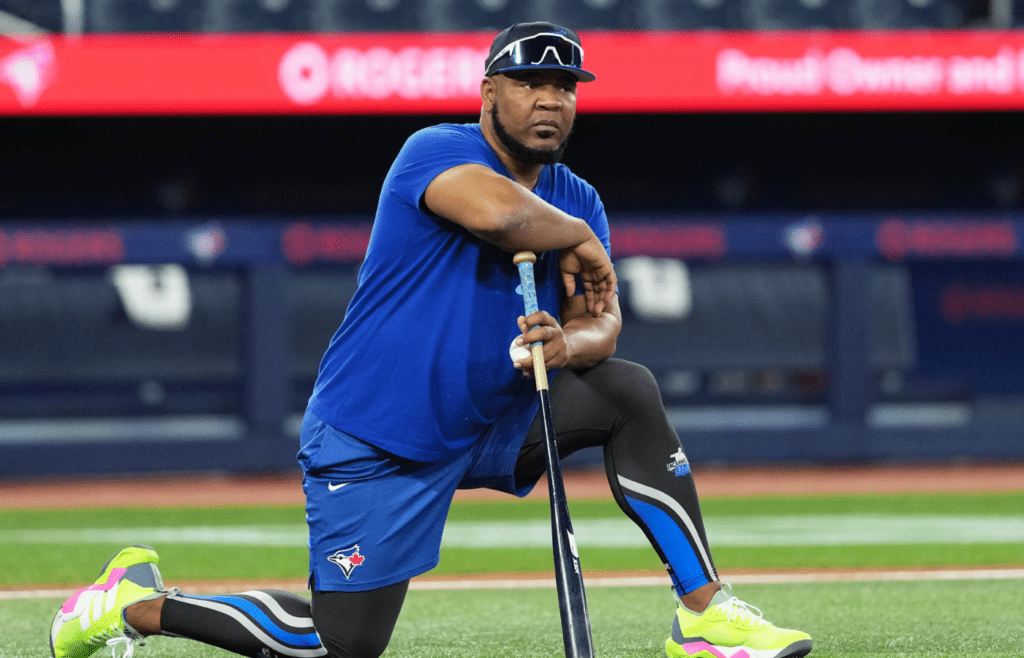 May 18, 2025; Toronto, Ontario, CAN; Former player and assistant to the Toronto Blue Jays coaching staff Edwin Encarnacion watches batting practice before a game against the Detroit Tigers at Rogers Centre. Mandatory Credit: Nick Turchiaro-Imagn Images