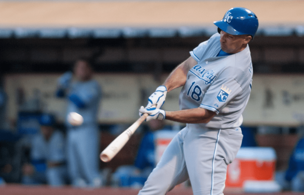 Aug 1, 2014; Oakland, CA, USA; Kansas City Royals right fielder Raul Ibanez (18) hits a home run against the Oakland Athletics during the fifth inning at O.co Coliseum. Mandatory Credit: Ed Szczepanski-Imagn Images