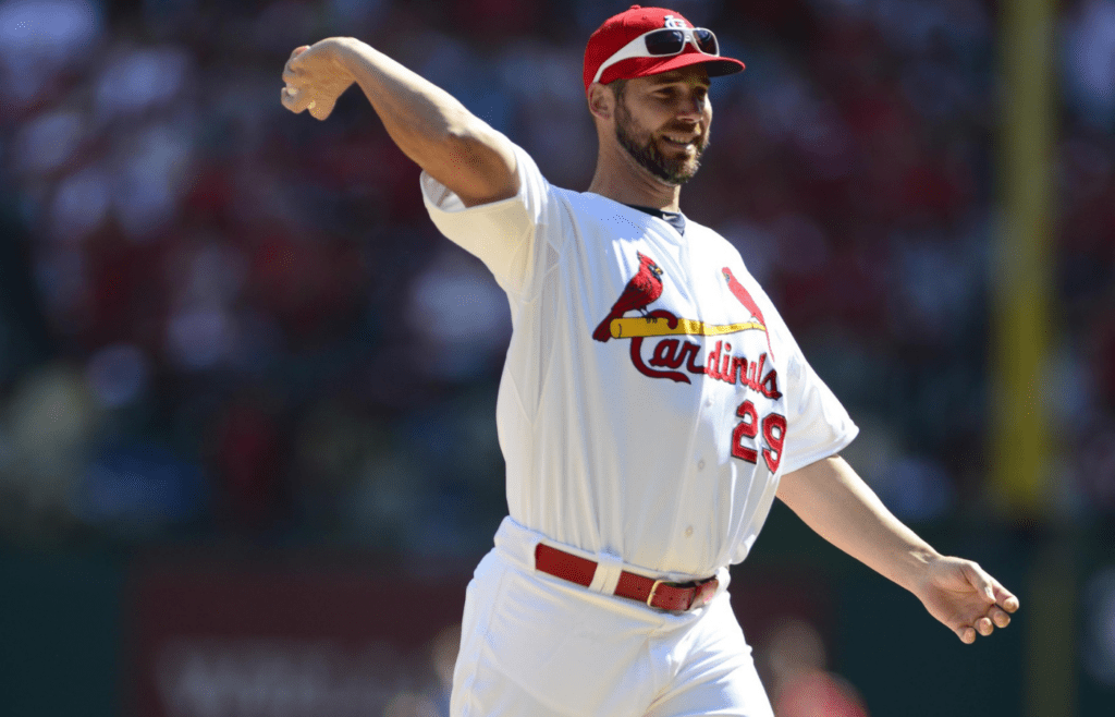 Oct 4, 2013; St. Louis, MO, USA; St. Louis Cardinals pitcher Chris Carpenter (29) throws out the ceremonial first pitch before game two of the National League divisional series playoff baseball game against the Pittsburgh Pirates at Busch Stadium. Mandatory Credit: Jeff Curry-Imagn Images