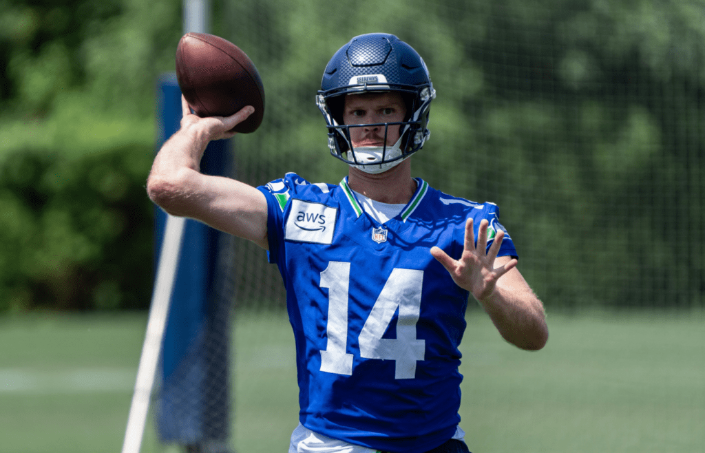 Jun 11, 2025; Renton, WA, USA; Seattle Seahawks quarterback Sam Darnold (14) passes the ball during mini-camp at Virginia Mason Athletic Center. Mandatory Credit: Stephen Brashear-Imagn Images