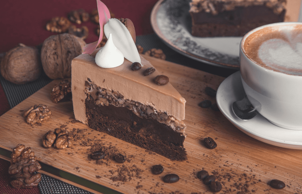 A shelf filled with cake and brownie mixes