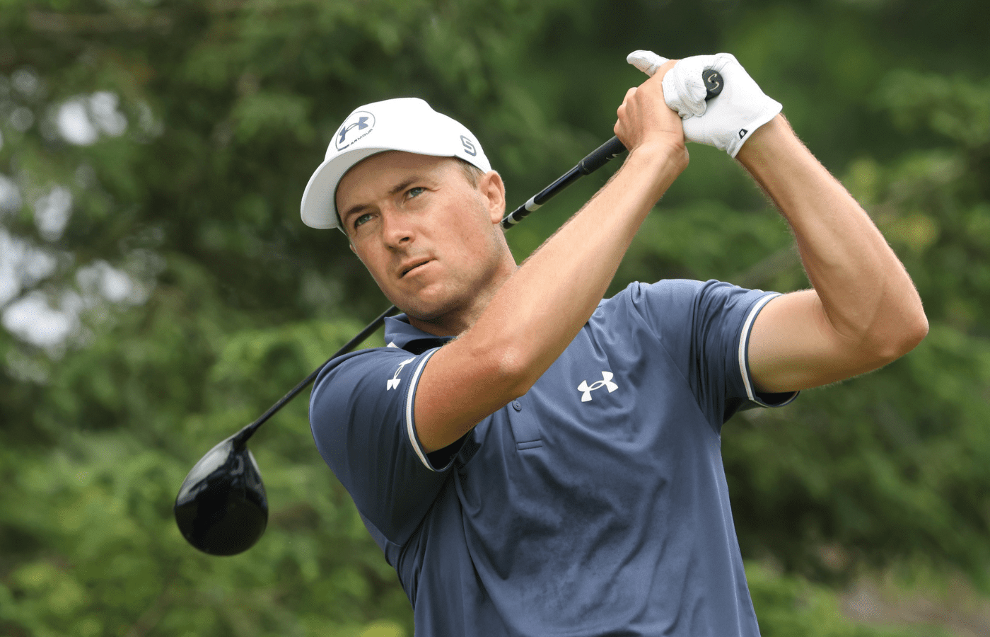 Jordan Spieth plays his shot from the first tee during the final round of the U.S. Open golf tournament.