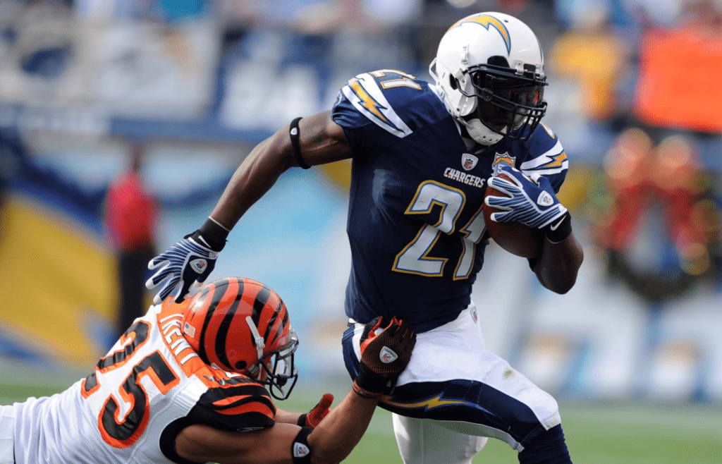 December 20, 2009; San Diego, CA, USA; San Diego Chargers running back LaDainian Tomlinson (21) runs for a short gain during the first quarter against the Cincinnati Bengals at Qualcomm Stadium. Mandatory Credit: Christopher Hanewinckel-Imagn Images