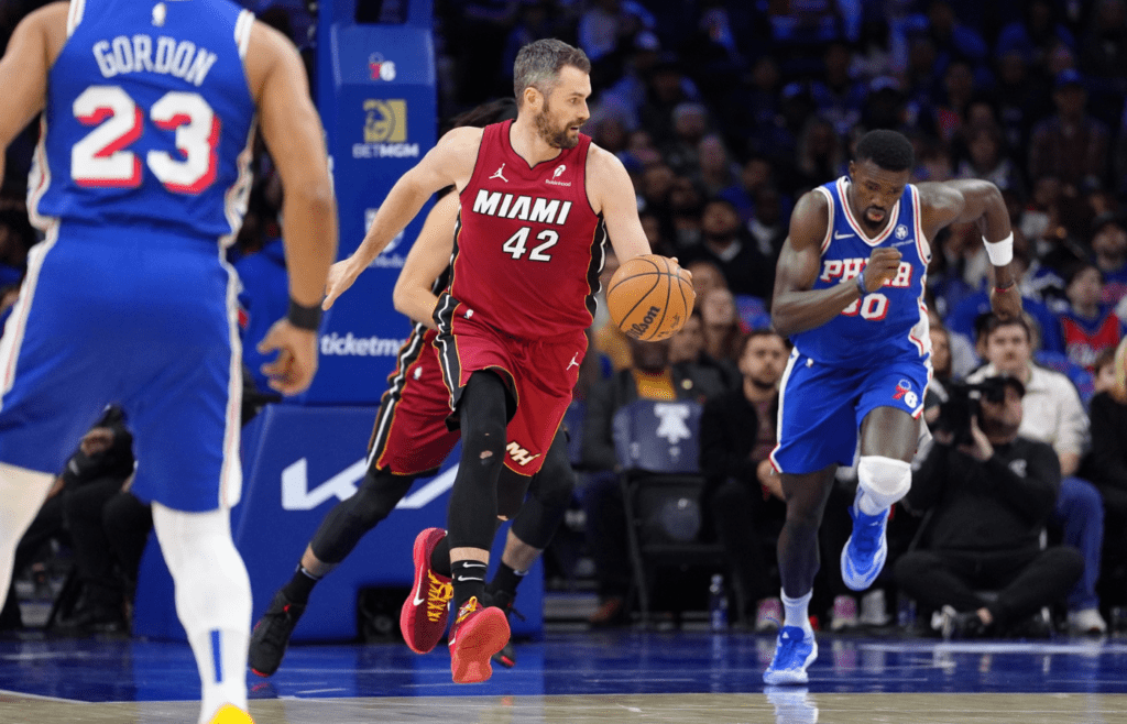 Feb 5, 2025; Philadelphia, Pennsylvania, USA; Miami Heat forward Kevin Love (42) drives with the ball against the Philadelphia 76ers in the first quarter at Wells Fargo Center. Mandatory Credit: Kyle Ross-Imagn Images