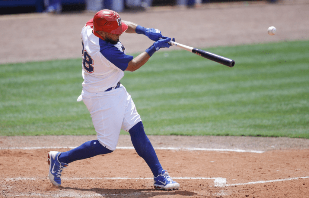May 31, 2021; St. Lucie, Florida, USA; Dominican Republic left fielder Melky Cabrera (28) connects for a base hit in the sixth inning of the game against Puerto Rico during the WBSC Baseball Americas Qualifier series of baseball games at Clover Park. Mandatory Credit: Sam Navarro-Imagn Images