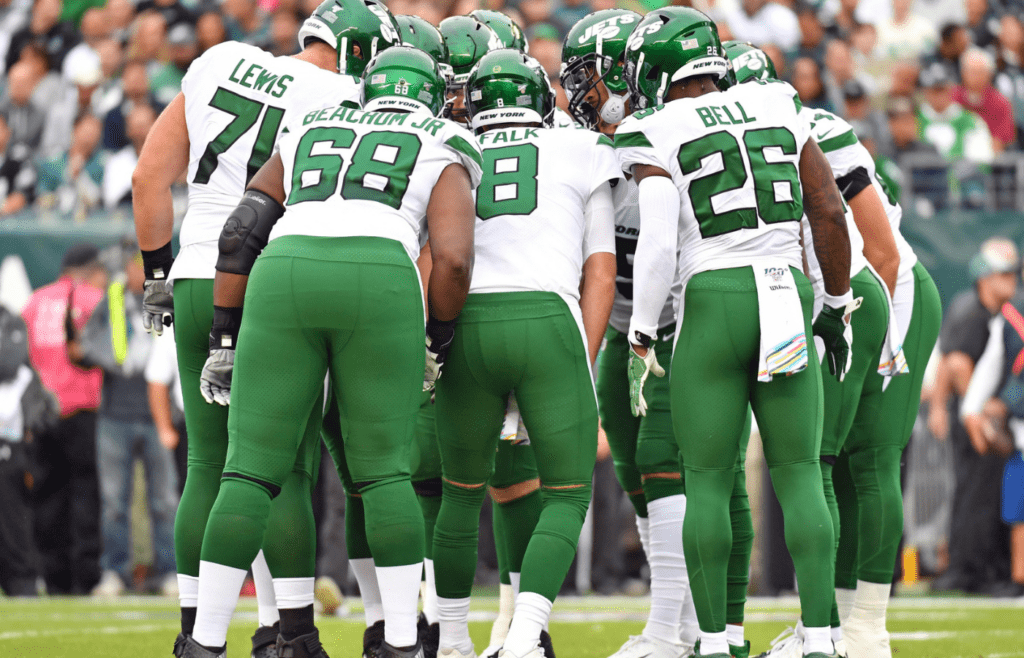 Oct 6, 2019; Philadelphia, PA, USA; New York Jets quarterback Luke Falk (8) leads his team in the huddle against the Philadelphia Eagles at Lincoln Financial Field. Mandatory Credit: Eric Hartline-Imagn Images