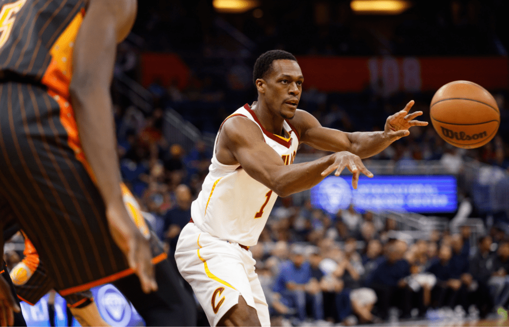 Apr 5, 2022; Orlando, Florida, USA; Cleveland Cavaliers guard Rajon Rondo (1) passes the ball against the Orlando Magic in the first half at Amway Center. Mandatory Credit: Nathan Ray Seebeck-Imagn Images