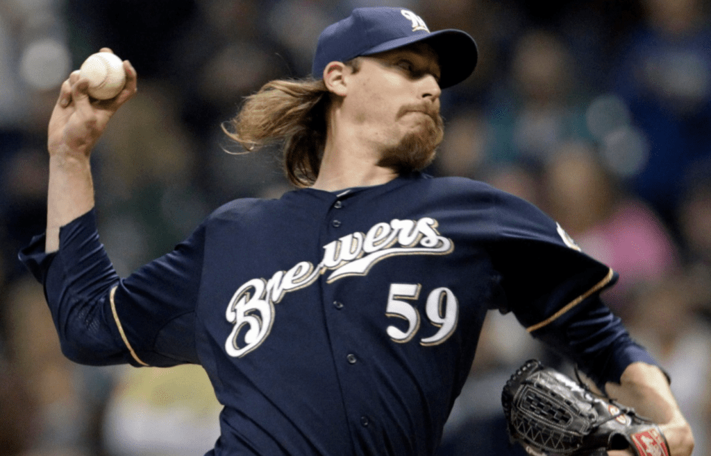 Milwaukee Brewer pitcher John Axford throws during the ninth inning of their game against the Houston Astros Tuesday, April 24, 2012 at Miller Park in Milwaukee, Wis. MARK HOFFMAN/MHOFFMAN@JOURNALSENTINEL.COM