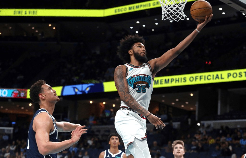 Apr 13, 2025; Memphis, Tennessee, USA; Memphis Grizzlies forward Marvin Bagley III (35) shoots during the fourth quarter against the Dallas Mavericks at FedExForum. Mandatory Credit: Petre Thomas-Imagn Images