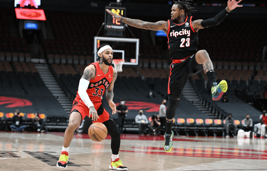 Toronto Raptors guard Gary Trent Jr. (33) controls the ball as Portland Trail Blazers guard Ben McLemore (23) flies past looking to block a shot in the second half at Scotiabank Arena.
