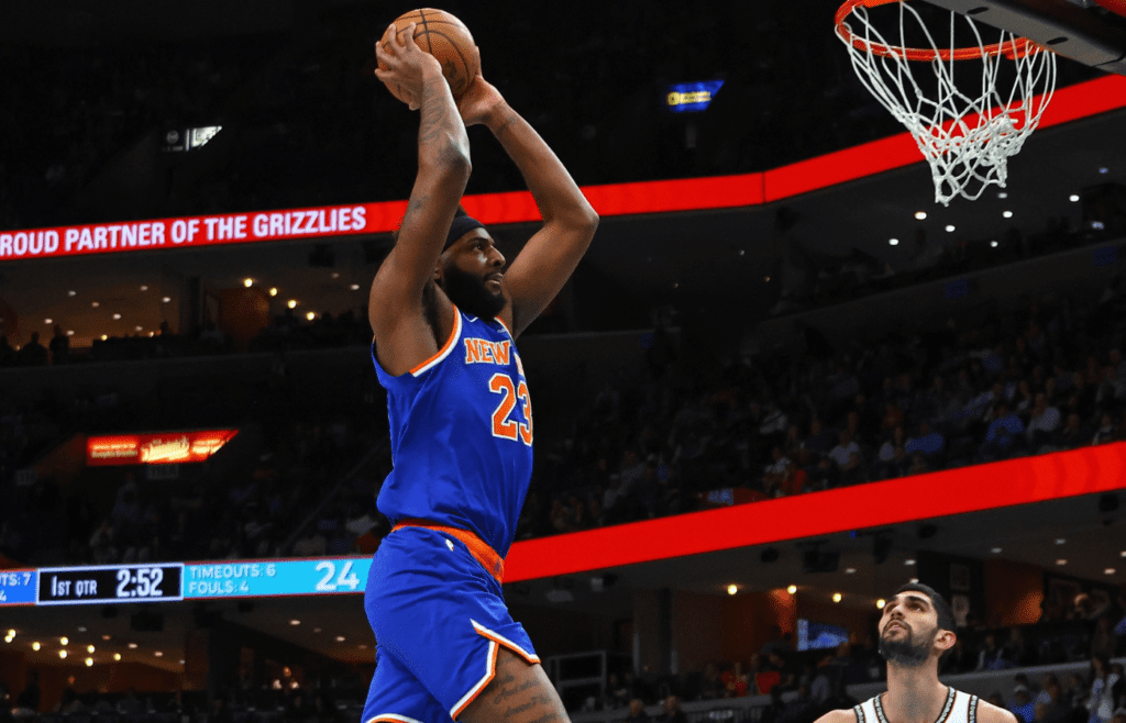 New York Knicks center Mitchell Robinson (23) dunks during the first quarter against the Memphis Grizzlies at FedExForum.