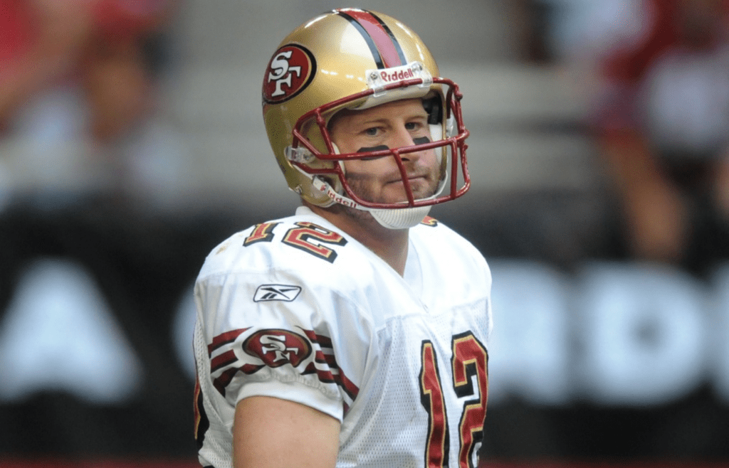 Nov. 25, 2007; Glendale, AZ, USA; San Francisco 49ers quarterback Trent Dilfer (12) against the Arizona Cardinals at University of Phoenix Stadium. The 49ers defeated the Cardinals 37-31 in overtime. Mandatory Credit: Mark J. Rebilas-Imagn Images