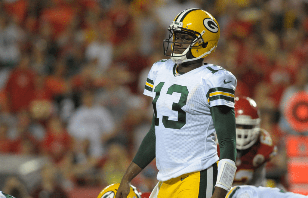 Aug 29, 2013; Kansas City, MO, USA; Green Bay Packers quarterback Vince Young (13) looks to the sidelines during the second half of the game against the Kansas City Chiefs at Arrowhead Stadium. The Chiefs won 30-8. Mandatory Credit: Denny Medley-Imagn Images