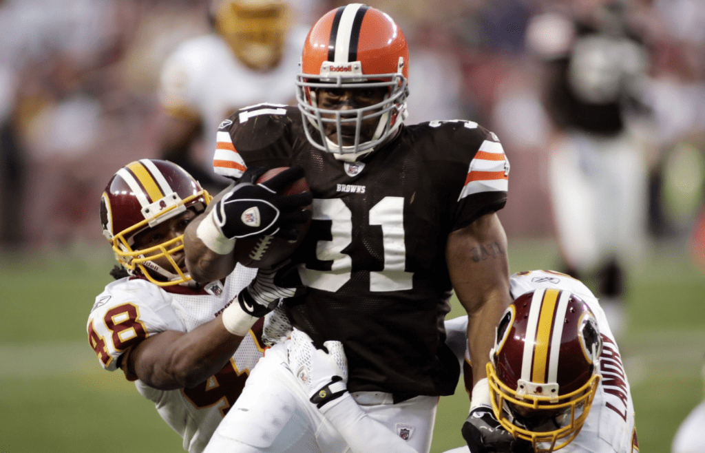 October 19, 2008; Landover, MD, USA; Cleveland Browns running back Jamal Lewis (31) is tackled by Washington Redskins safety Chris Horton (48) and safety LaRon Landry (30) in the third quarter at FedEx Field. The Redskins won 14-11. Mandatory Credit: Geoff Burke-Imagn Images
