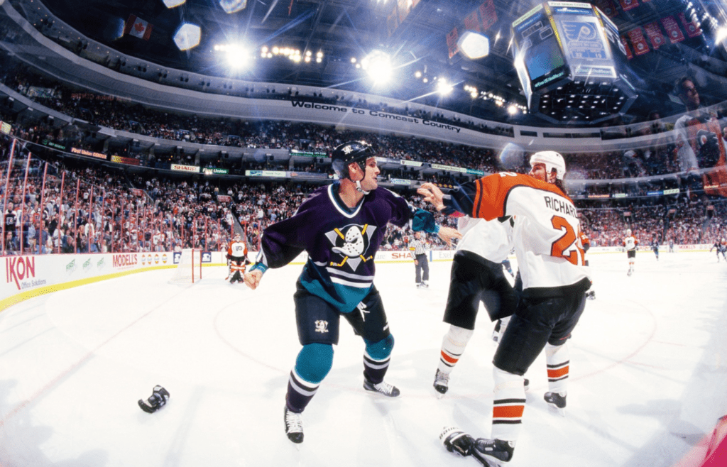 Oct 11, 1998; Philadelphia, PA, USA; FILE PHOTO; Mighty Ducks of Anaheim left wing Stu Grimson (32) in a fight with Philadelphia Flyers defenseman Luke Richardson (22) at First Union Center. Mandatory Credit: Lou Capozzola-USA TODAY NETWORK