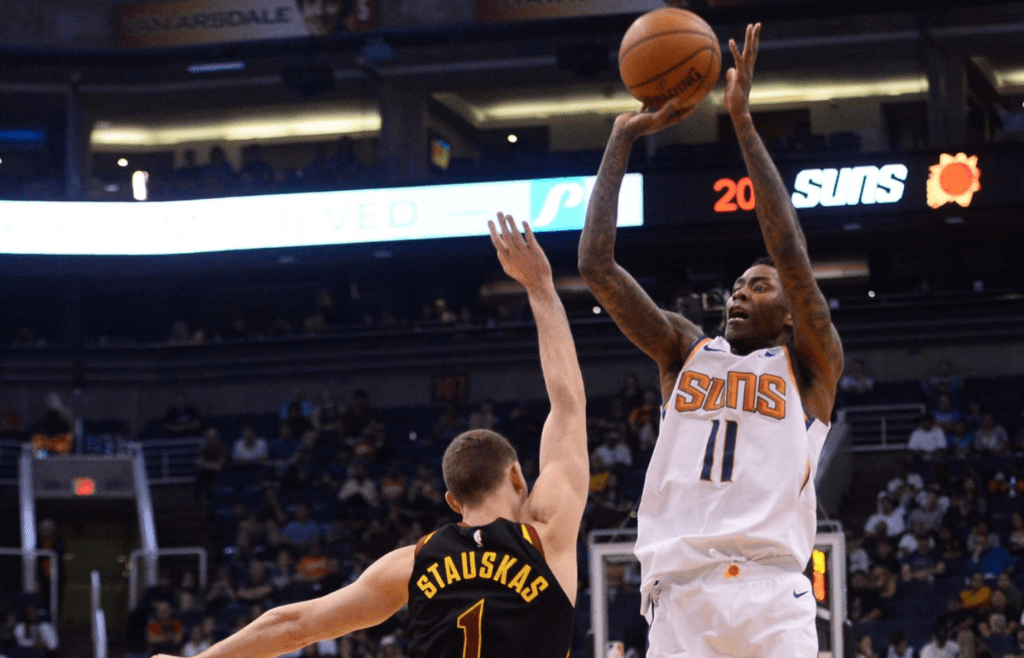 Phoenix Suns guard Jamal Crawford (11) shoots over Cleveland Cavaliers guard Nik Stauskas (1) during the second half at Talking Stick Resort Arena.