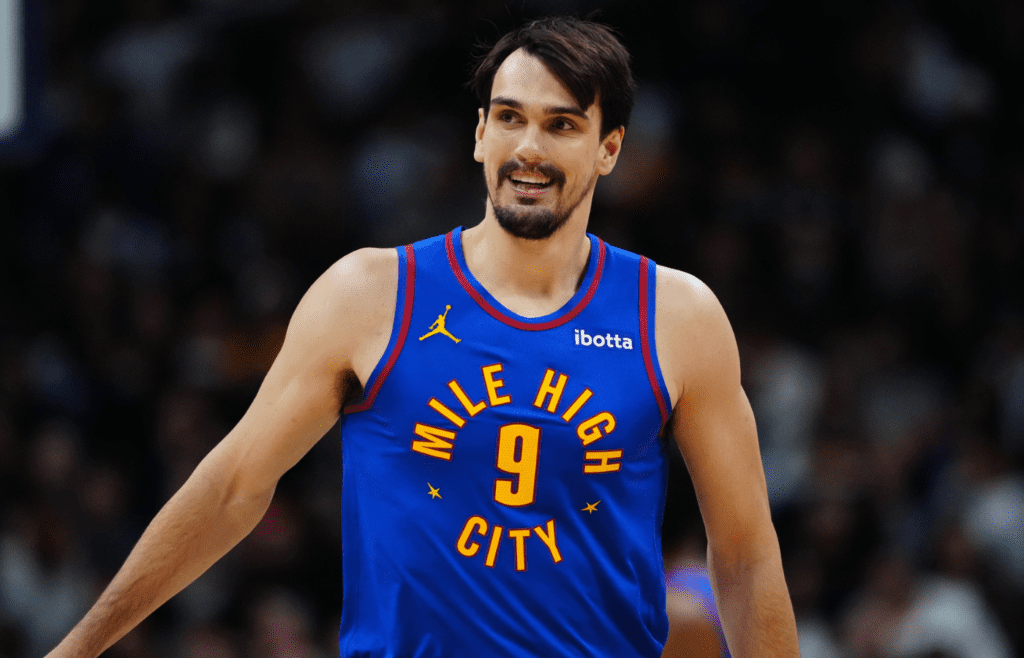 Denver Nuggets forward Dario Saric (9) reacts in the second half against the LA Clippers at Ball Arena.