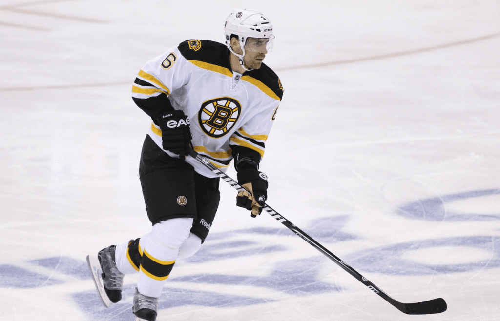 May 12, 2013; Toronto, Ontario, CAN; Boston Bruins defenseman Wade Redden (6) carries the puck against the Toronto Maple Leafs during game six of the first round of the 2013 Stanley Cup playoffs at the Air Canada Centre. The Maple Leafs beat the Bruins 2-1. Mandatory Credit: Tom Szczerbowski-Imagn Images
