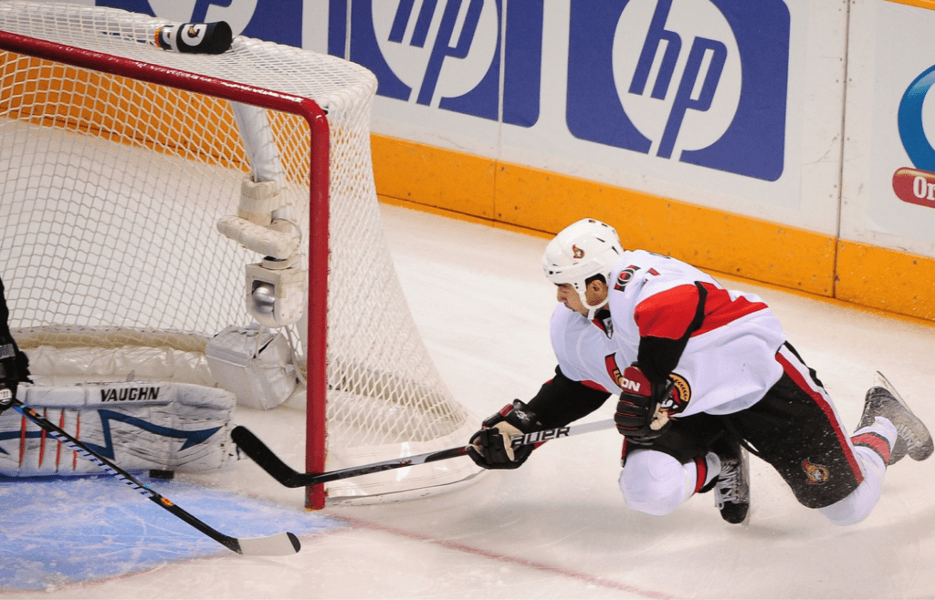 Ottawa Senators right wing Jonathan Cheechoo has his shot blocked against the San Jose Sharks during the first period at HP Pavilion.