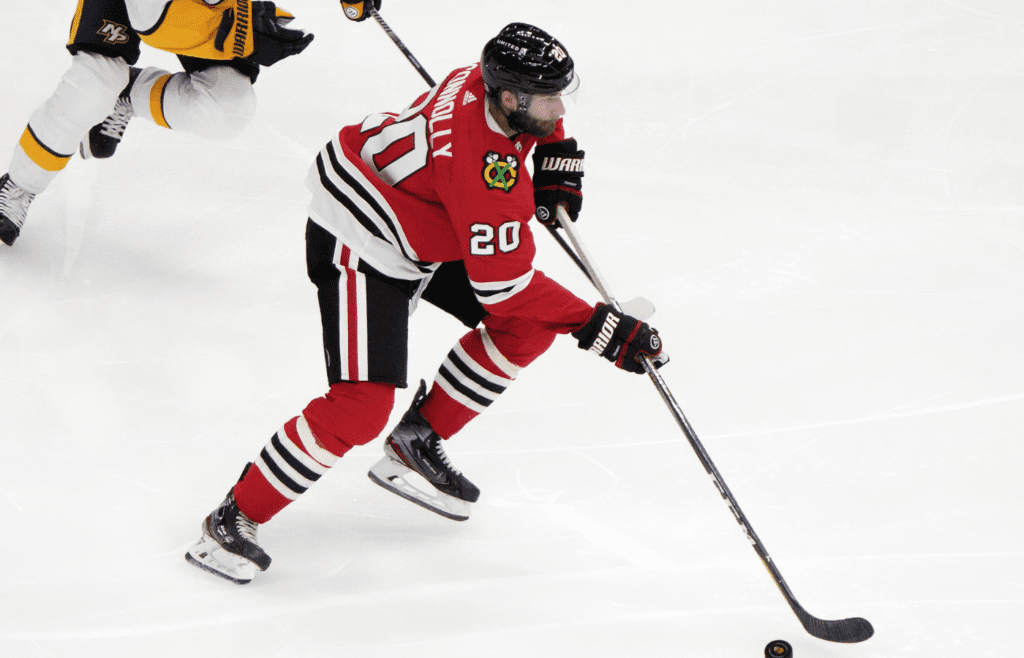 Chicago Blackhawks right wing Brett Connolly (20) skates with the puck against the Nashville Predators during the second period at the United Center.