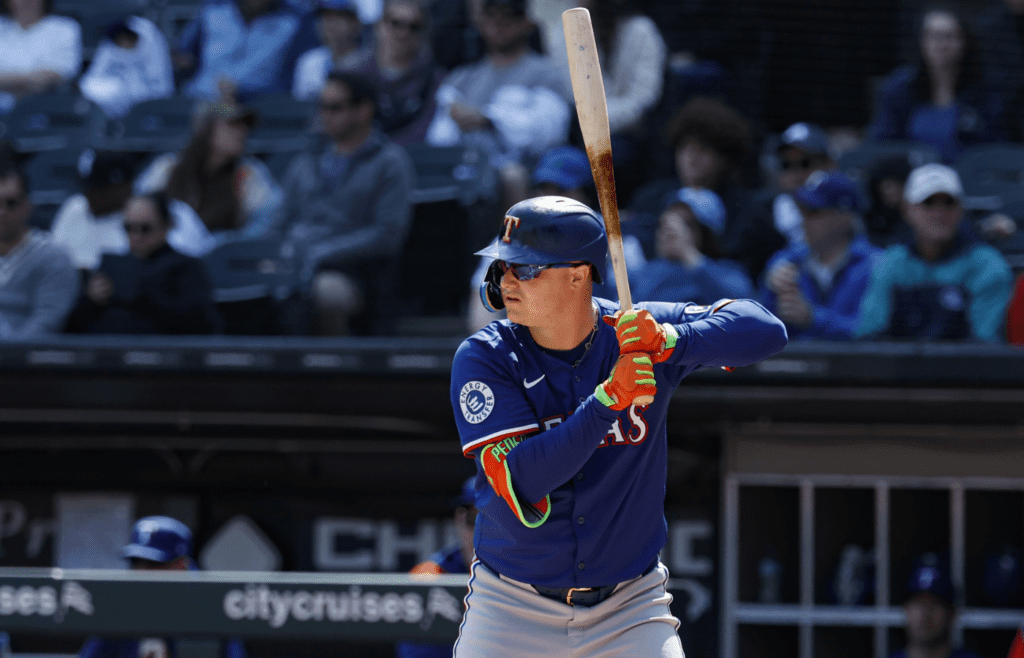Texas Rangers designated hitter Joc Pederson (4) bats against the Chicago White Sox during the first inning at Rate Field.