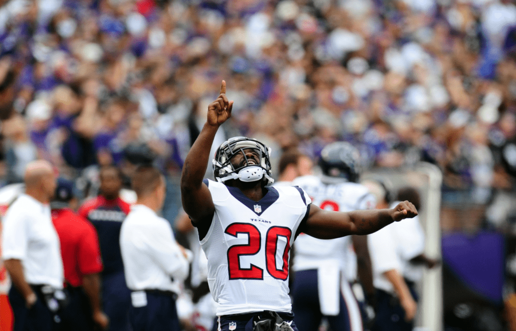 Sep 22, 2013; Baltimore, MD, USA; Houston Texans safety Ed Reed (20) points to the sky prior to the game against the Baltimore Ravens at M&T Bank Stadium. Mandatory Credit: Evan Habeeb-Imagn Images