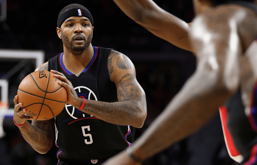 Dec 14, 2015; Auburn Hills, MI, USA; Los Angeles Clippers forward Josh Smith (5) looks to pass the ball during the second quarter of the game against the Detroit Pistons at The Palace of Auburn Hills. The Los Angeles Clippers defeated the Detroit Pistons 105-103 in overtime. Mandatory Credit: Leon Halip-Imagn Images