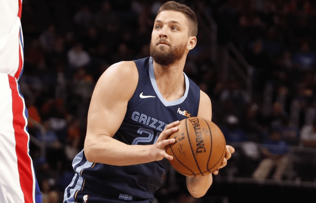 Apr 9, 2019; Detroit, MI, USA; Memphis Grizzlies forward Chandler Parsons (25) controls the ball during the second quarter against the Detroit Pistons at Little Caesars Arena. Mandatory Credit: Raj Mehta-Imagn Images