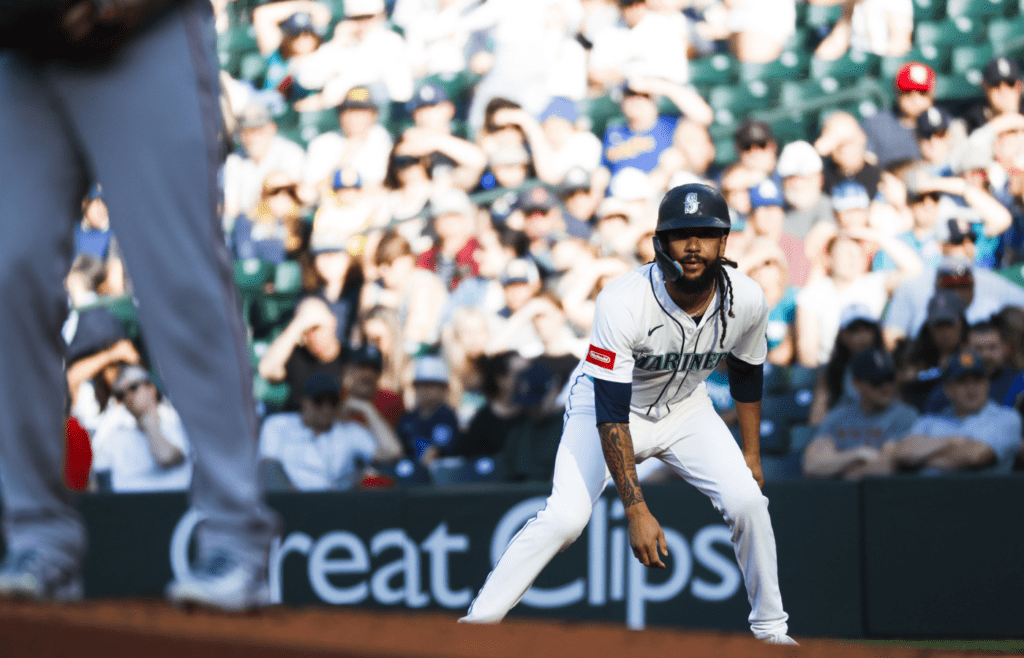 Jun 16, 2025; Seattle, Washington, USA; Seattle Mariners shortstop J.P. Crawford (3) takes a lead from first base during the first inning against the Boston Red Sox at T-Mobile Park. Mandatory Credit: Joe Nicholson-Imagn Images