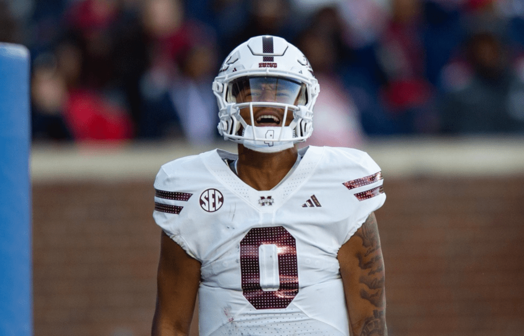 Mississippi State's quarterback Michael Van Buren Jr. (0) celebrates scoring a touchdown during the Egg Bowl game against Mississippi at Vaught-Hemingway Stadium on Friday, Nov. 29, 2024.