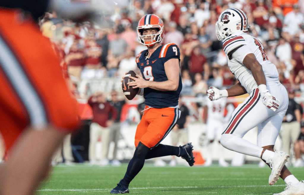 Dec 31, 2024; Orlando, FL, USA; Illinois Fighting Illini quarterback Luke Altmyer (9) gets ready to throw the ball against the South Carolina Gamecocks in the first quarter at Camping World Stadium. Mandatory Credit: Jeremy Reper-Imagn Images