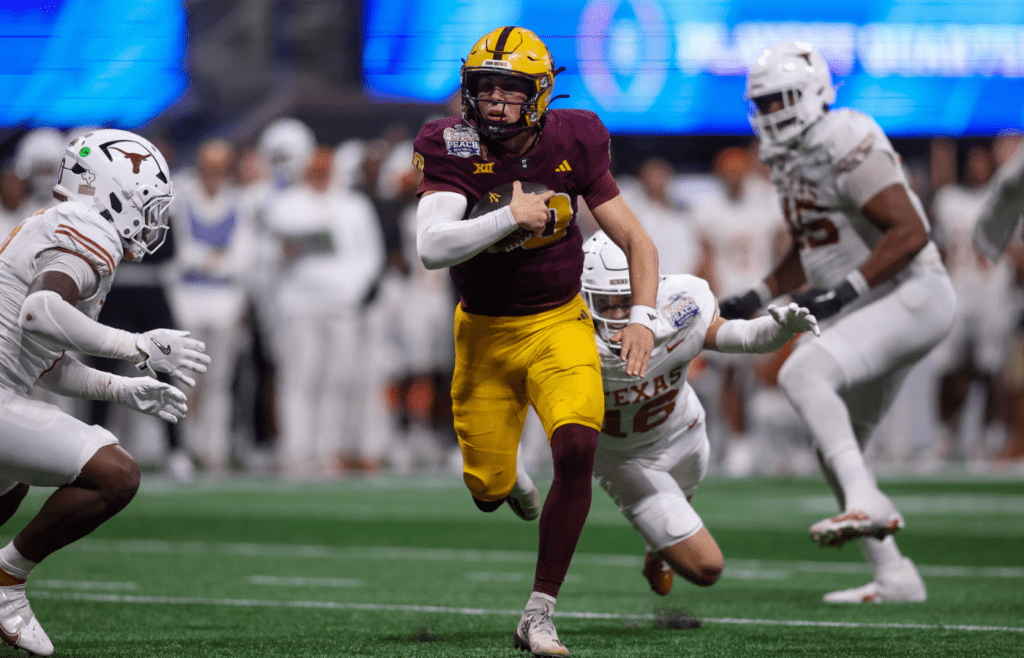 Jan 1, 2025; Atlanta, GA, USA; Arizona State Sun Devils quarterback Sam Leavitt (10) scrambles against the Texas Longhorns in overtime at Mercedes-Benz Stadium. Mandatory Credit: Brett Davis-Imagn Images