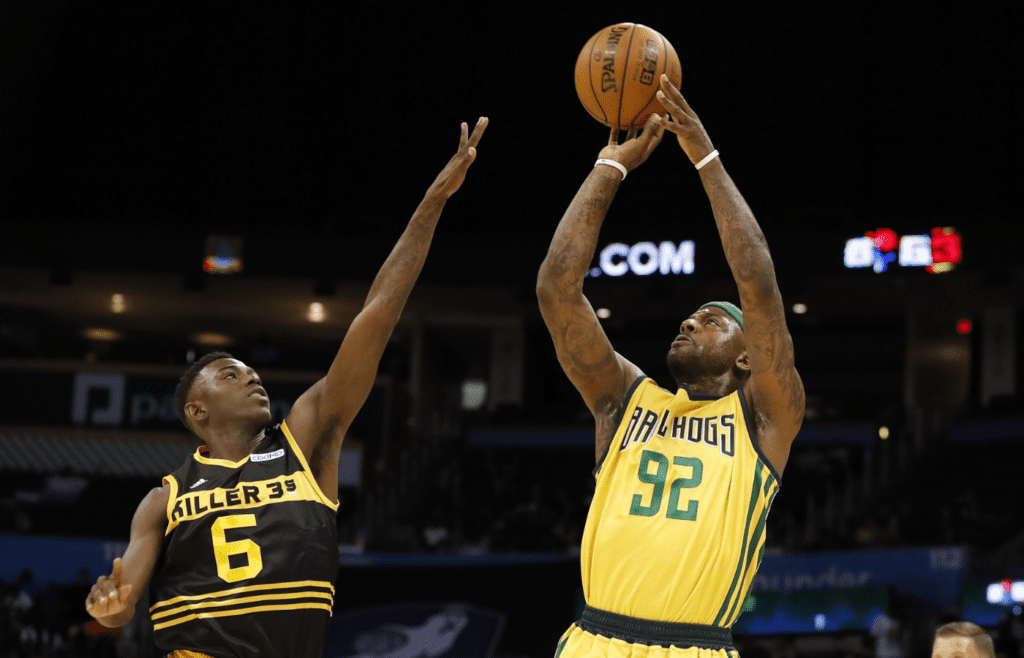 Jul 21, 2019; Oklahoma City, OK, USA; Ball Hogs player DeShawn Stevenson (92) shoots as Killer 3 s player Frank Session defends during a game at Chesapeake Energy Arena. Mandatory Credit: Alonzo Adams-Imagn Images