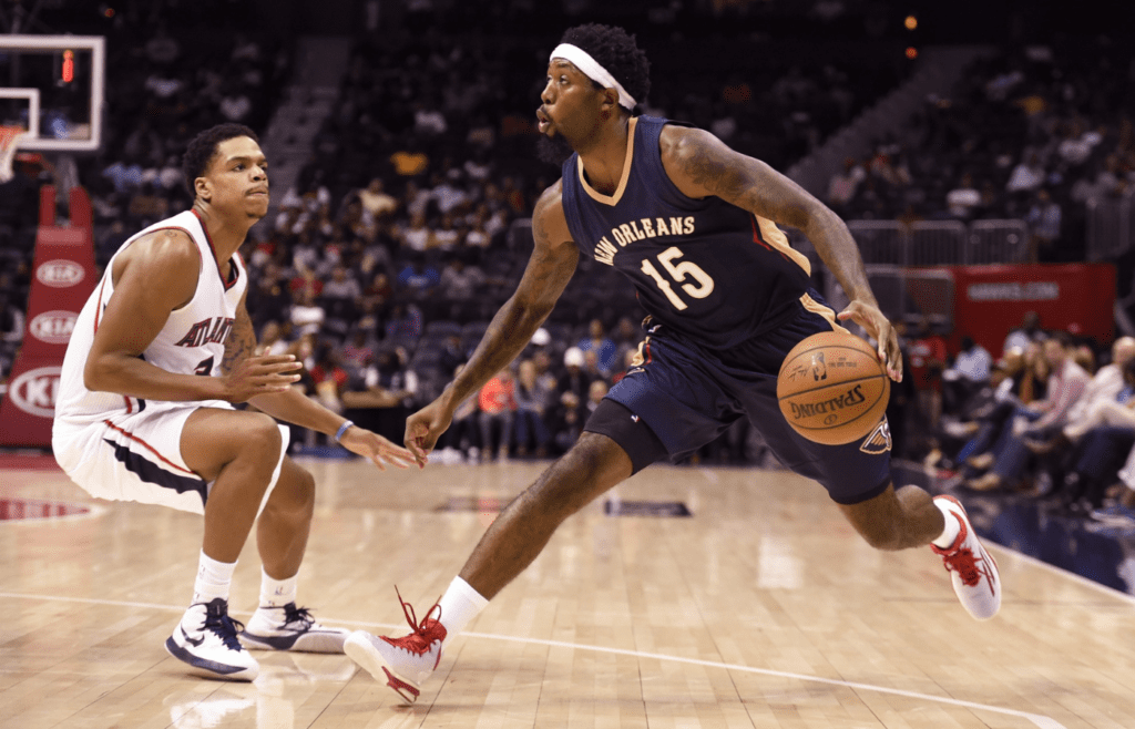 Oct 6, 2014; Atlanta, GA, USA; New Orleans Pelicans forward John Salmons (15) works against Atlanta Hawks forward Jarell Eddie (3) during the second half at Philips Arena. The Hawks defeated the Pelicans 93-87. Mandatory Credit: Dale Zanine-Imagn Images