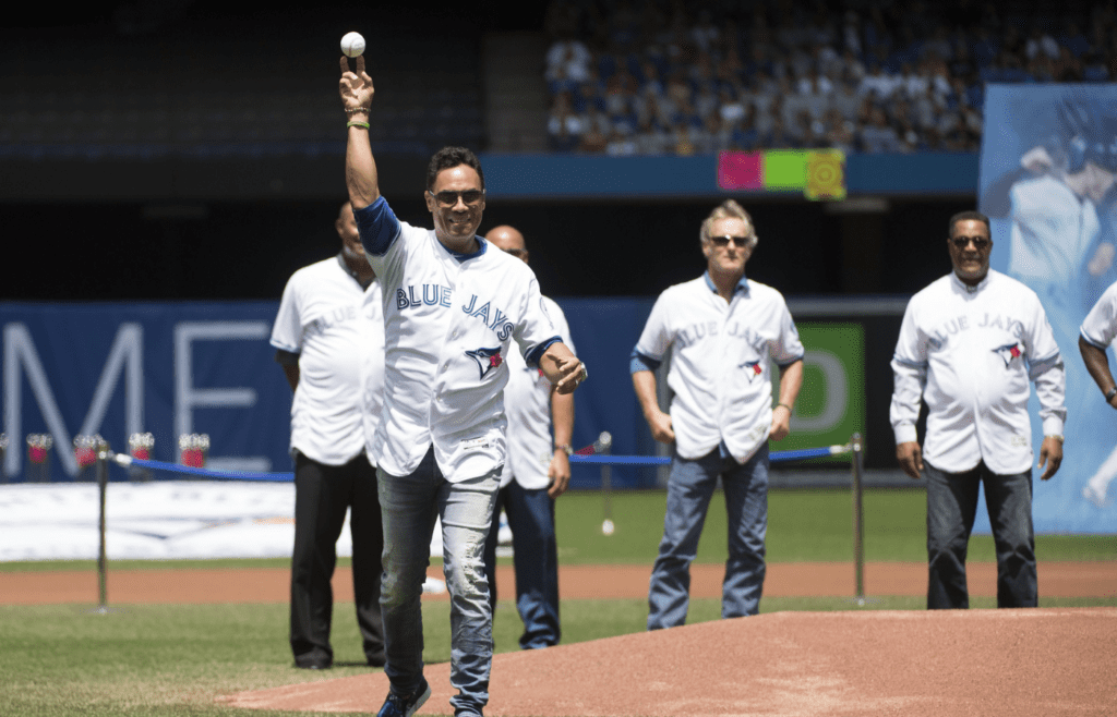 Jul 10, 2016; Toronto, Ontario, CAN; Former Toronto Blue Jays player Roberto Alomar throws out the ceremonial first pitch before a game against the Detroit Tigers at Rogers Centre. The Toronto Blue Jays won 6-1. Mandatory Credit: Nick Turchiaro-Imagn Images