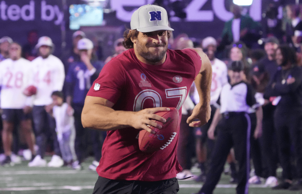 Jan 30, 2025; Orlando, FL, USA; NFC defensive end Nick Bosa of the San Francisco 49ers runs in the relay race during the Pro Bowl Skills Challenge at Nicholson Fieldhouse. Mandatory Credit: Kirby Lee-Imagn Images