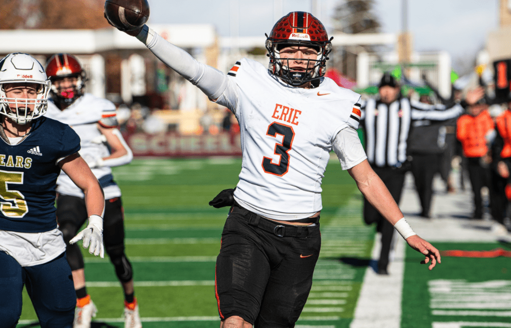 Erie quarterback Blake Barnett (3) tiptoes along the sidelines during the Tigers' 4A state championship game win over Palmer Ridge on Saturday, Dec. 2, 2023 at Canvas Stadium in Fort Collins, Colo.