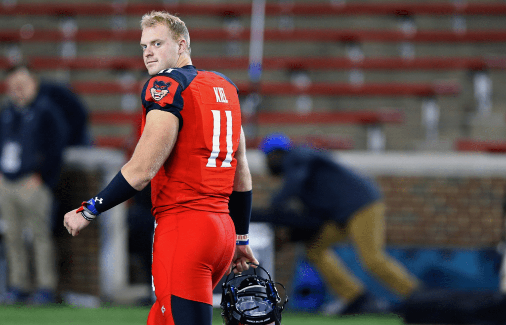 Nov 18, 2016; Cincinnati, OH, USA; Cincinnati Bearcats quarterback Gunner Kiel (11) walks off the field after the game against the Memphis Tigers at Nippert Stadium. Memphis won 34-7. Mandatory Credit: Aaron Doster-Imagn Images