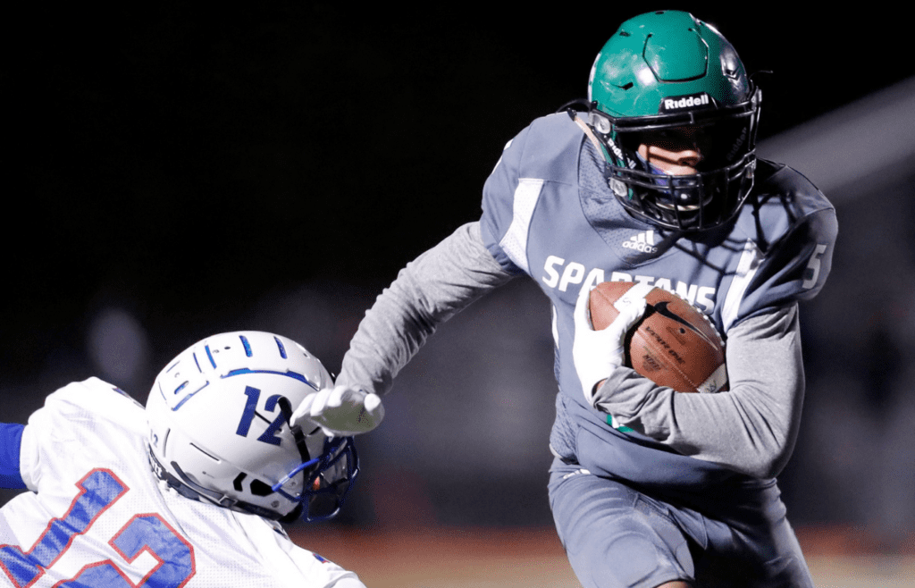 White Station's Brandon Harris (5) moves the ball past Bartlett's Jordan Standifer (12) on Friday, Nov. 8, 2019, during a game in the first round of the Division 1 Class 6A playoffs at Cordova High School. White Station defeated Bartlett 28-7. 110819whitestationvsbartlettfootball11