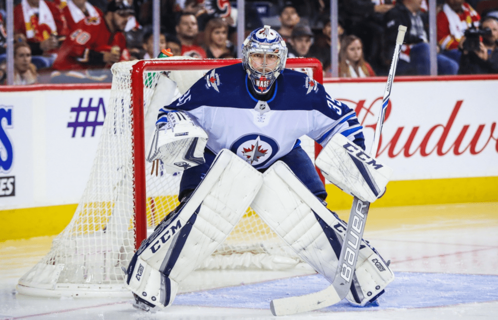 Oct 7, 2017; Calgary, Alberta, CAN; Winnipeg Jets goalie Steve Mason (35) guards his net against the Calgary Flames during the second period at Scotiabank Saddledome. Mandatory Credit: Sergei Belski-Imagn Images