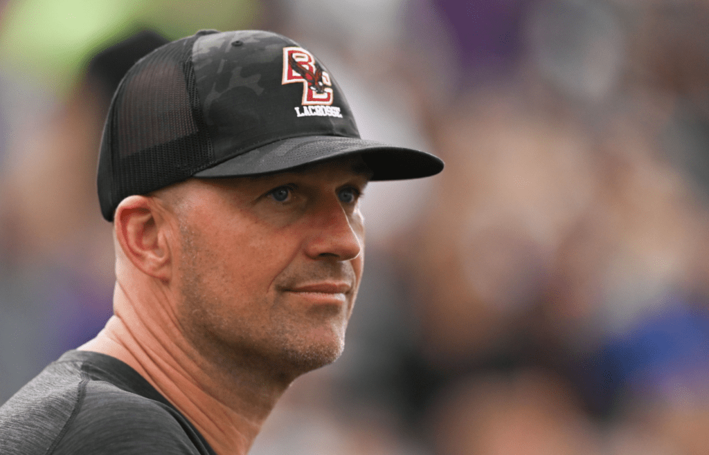 May 27, 2022; Baltimore, MD, USA; Matt Hasselbeck, a former American football quarterback and current analyst for ESPN's Sunday NFL Countdown, stands on the sidelines during the second half of the game between Boston College and Maryland at Johns Hopkins Homewood Field. Boston College defedzater Maryland 17-16 to advance to the division 1 finals . Mandatory Credit: Tommy Gilligan-Imagn Images