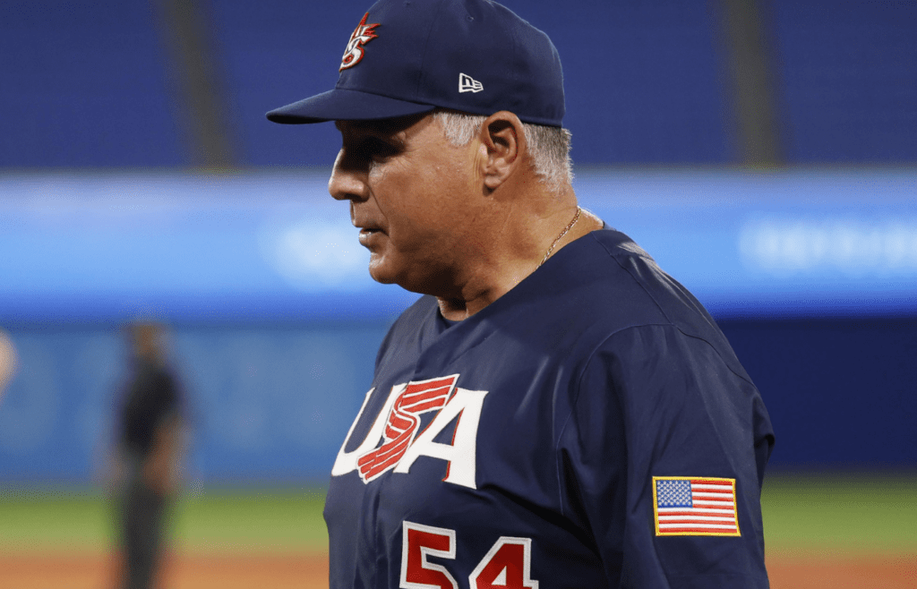 Aug 7, 2021; Yokohama, Japan; USA manager Mike Scioscia reacts against Japan during the seventh inning in the baseball gold medal match during the Tokyo 2020 Olympic Summer Games at Yokohama Baseball Stadium. Mandatory Credit: Yukihito Taguchi-Imagn Images