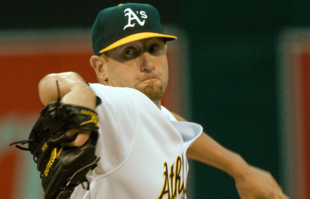 Dallas Braden throws against the Detroit Tigers during a MLB game at the Oakland Coliseum on May 19, 2010