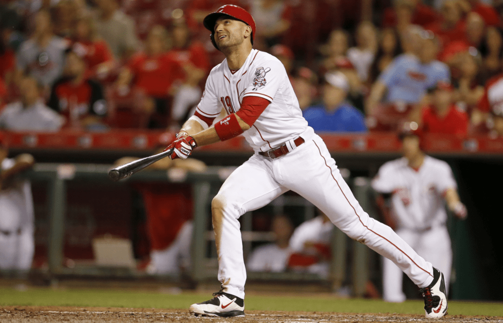 Cincinnati Reds first baseman Joey Votto (19) doubles in the fifth inning, scoring Cincinnati Reds center fielder Billy Hamilton (6) (not pictured) during the MLB game between the Cincinnati Reds and St. Louis Cardinals, Thursday, Sept. 10, 2015, at Great American Ball Park in Cincinnati