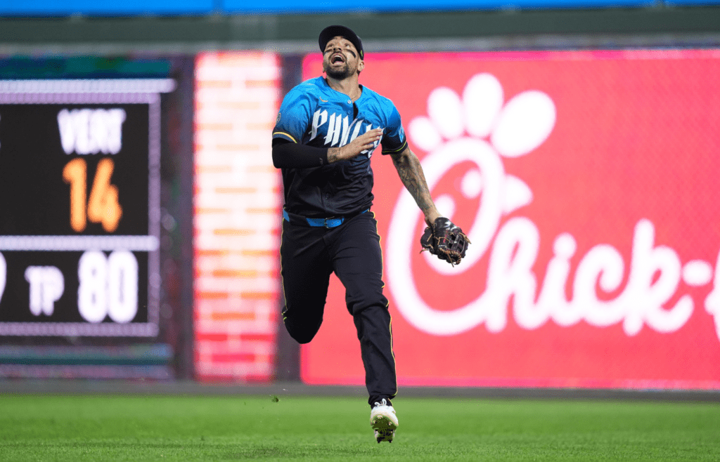 Jun 20, 2025; Philadelphia, Pennsylvania, USA; Philadelphia Phillies outfielder Nick Castellanos (8) chases a fly ball against the New York Mets in the fifth inning at Citizens Bank Park. Mandatory Credit: Kyle Ross-Imagn Images