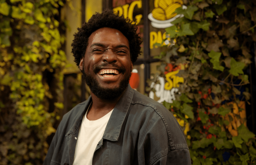 A person laughing at a complex joke