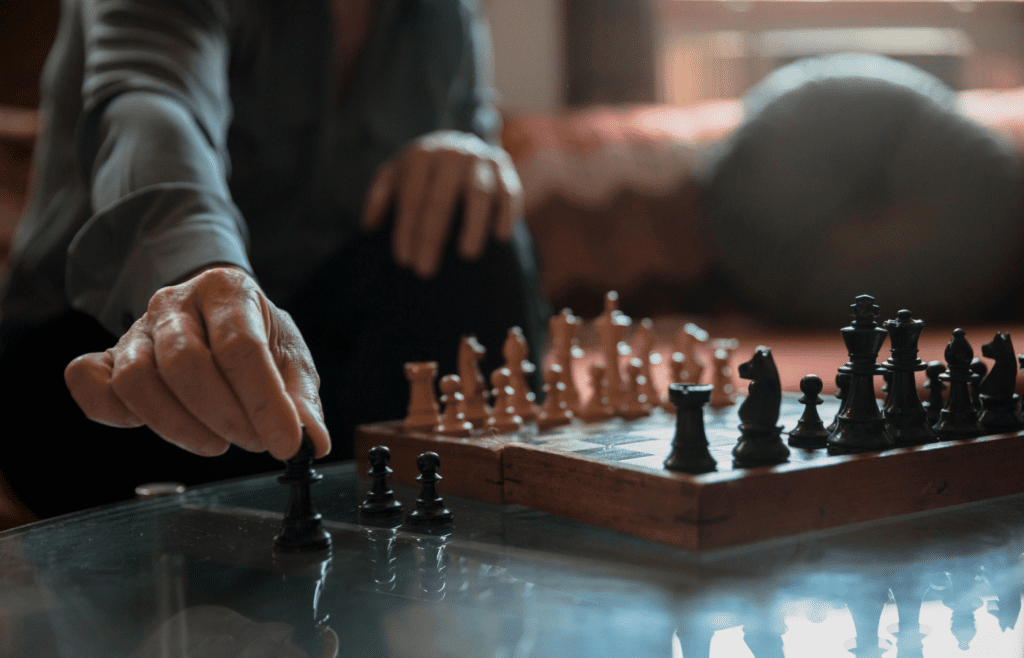 A person playing a strategy board game