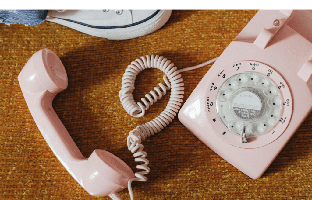 A curly phone cord tangled across a kitchen floor