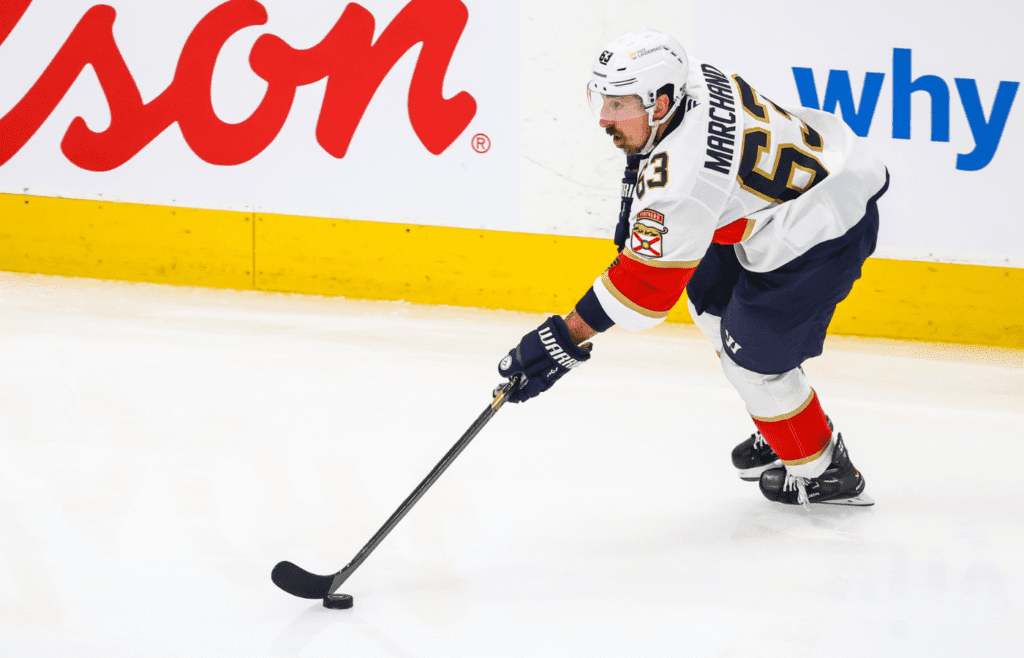Jun 14, 2025; Edmonton, Alberta, CAN; Florida Panthers center Brad Marchand (63) skates with the puck against the Edmonton Oilers during the second period in game five of the 2025 Stanley Cup Final at Rogers Place. Mandatory Credit: Sergei Belski-Imagn Images