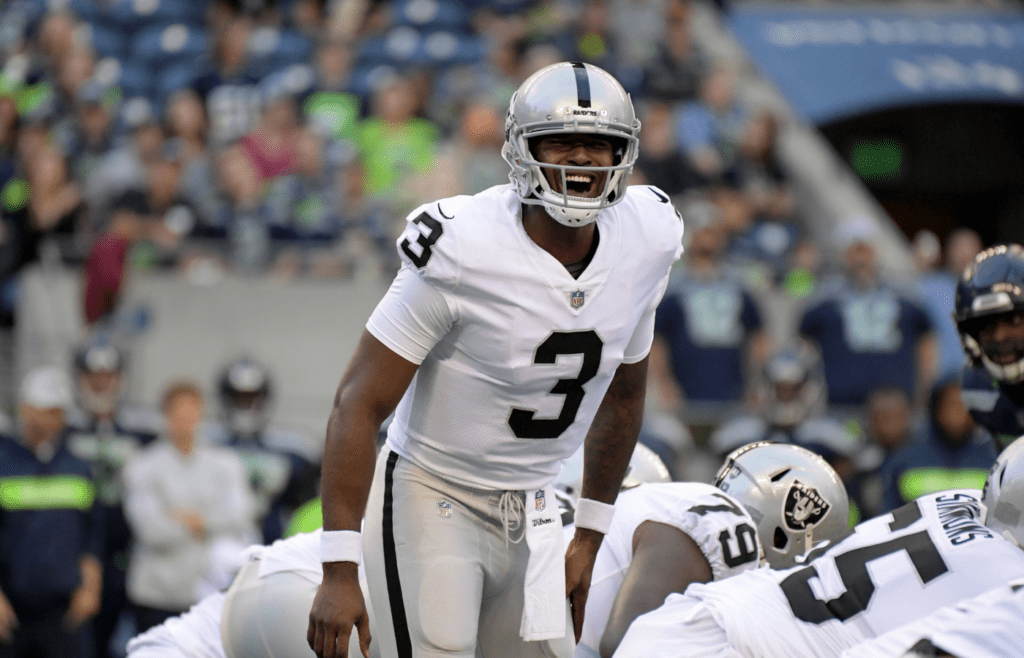Oakland Raiders quarterback EJ Manuel (3) yells out from the line of scrimmage during a preseason game against the Seattle Seahawks at CenturyLink Field.